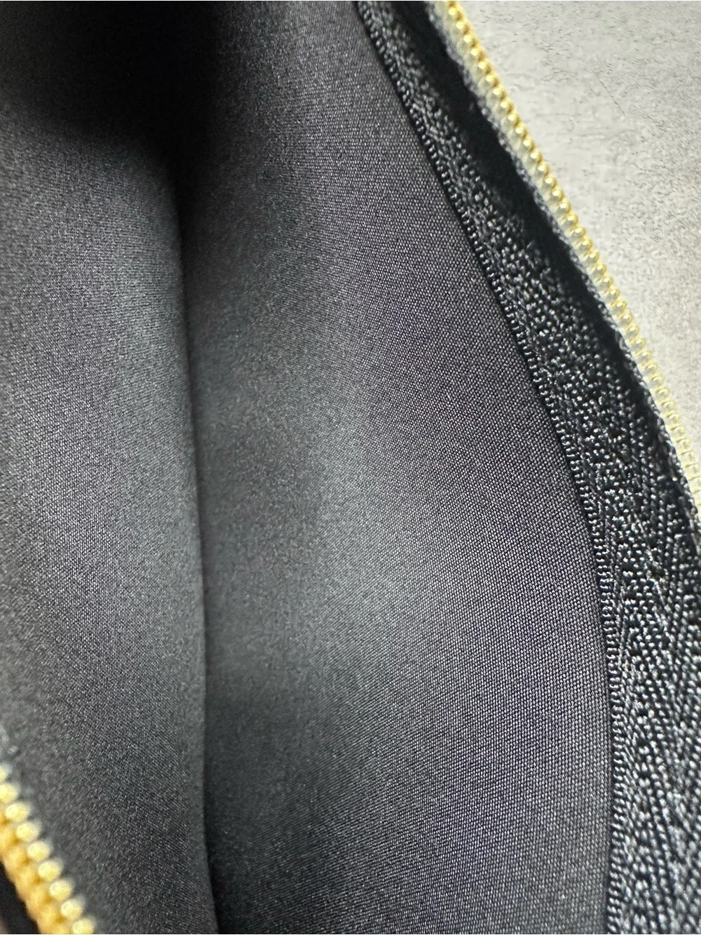 Stella McCartney Black Zip Pouch with Gold Medallion Charm